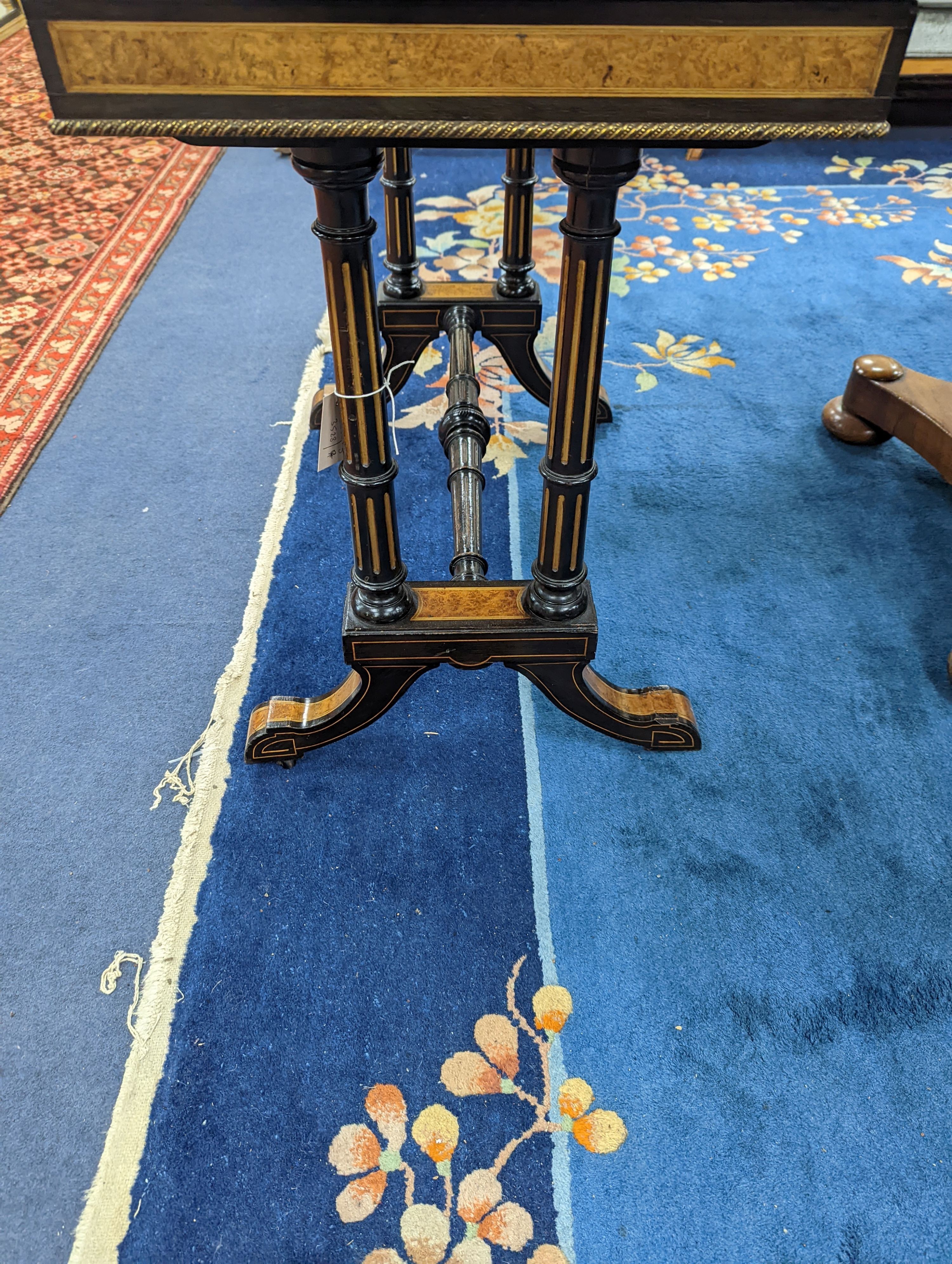 A Victorian part ebonised rectangular Amboyna folding card table, width 91cm, depth 46cm, height 77cm